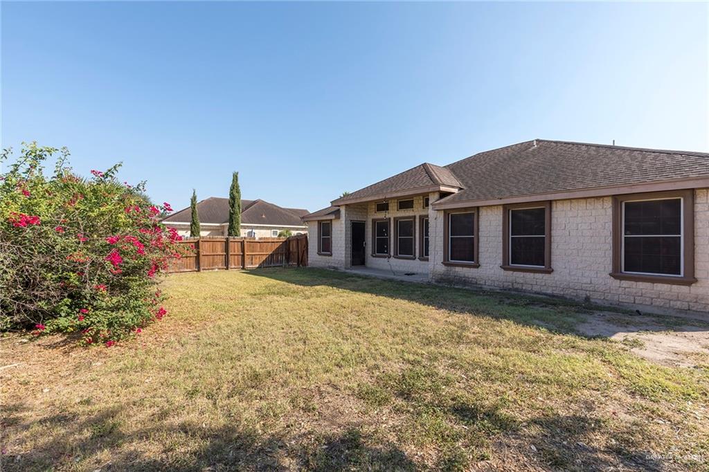 1909 Ezekiel Street Edinburg, TX 78542 - Photo 16 of 16 a front view of a house with a garden