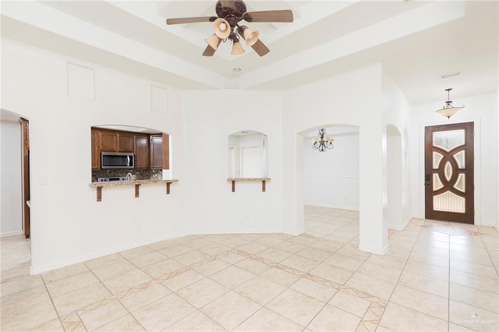 1909 Ezekiel Street Edinburg, TX 78542 - Photo 2 of 16 a view of a livingroom with a flat screen tv