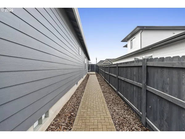 a view of a balcony with wooden floor