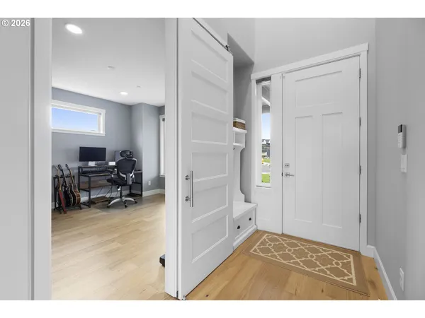 a room with furniture and a wooden floor