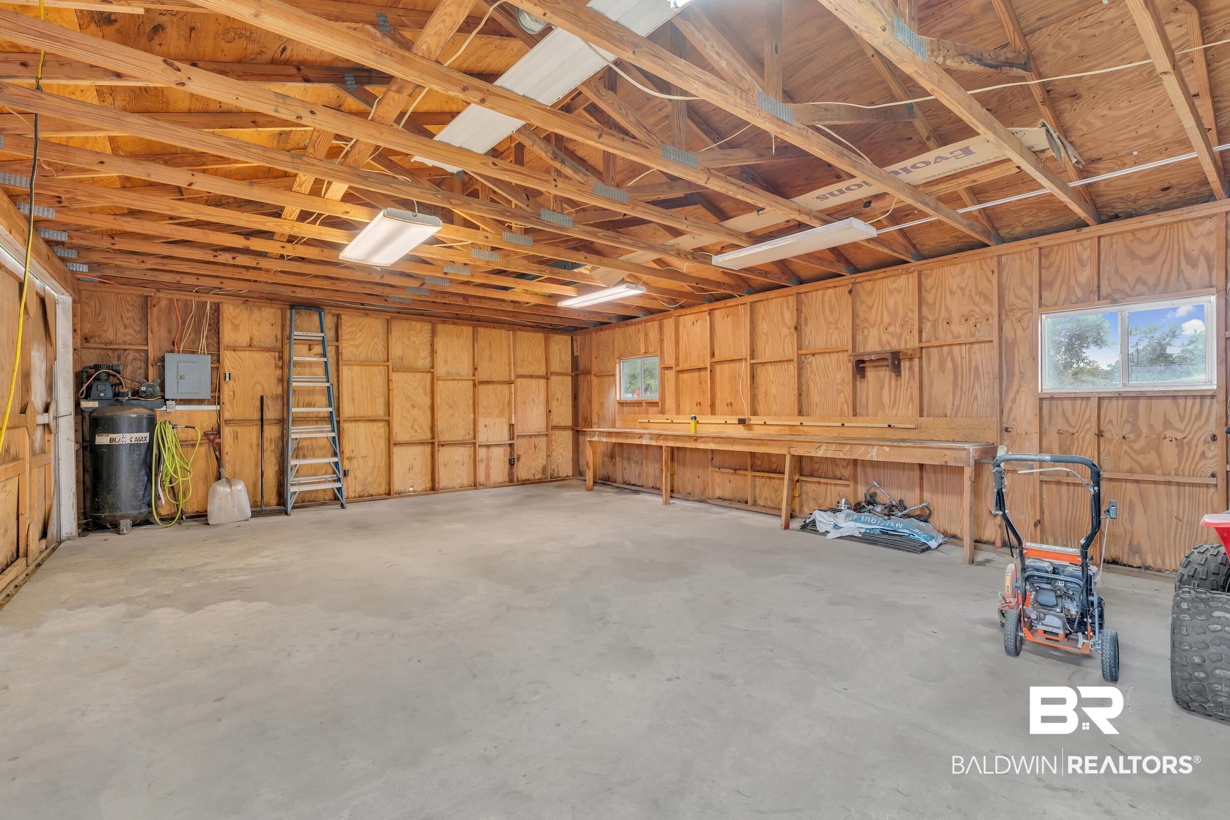 206 West Jackson Avenue Summerdale, AL 36580 - Photo 30 of 37 Garage featuring electric panel