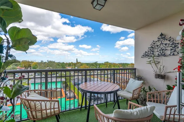 a view of a balcony with a table