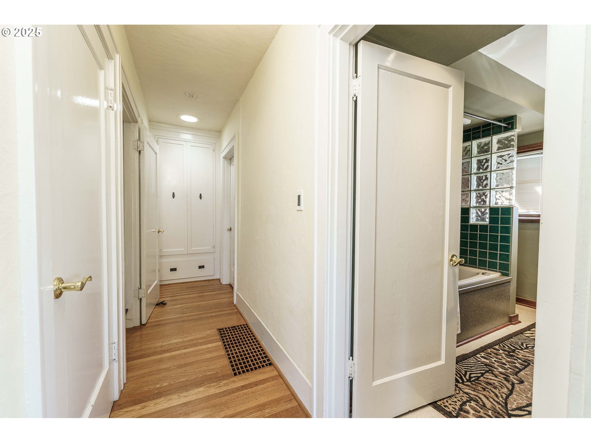 4216 Northeast 18th Avenue Portland, OR 97211 - Photo 18 of 46 a view of a hallway with wooden floor and staircase