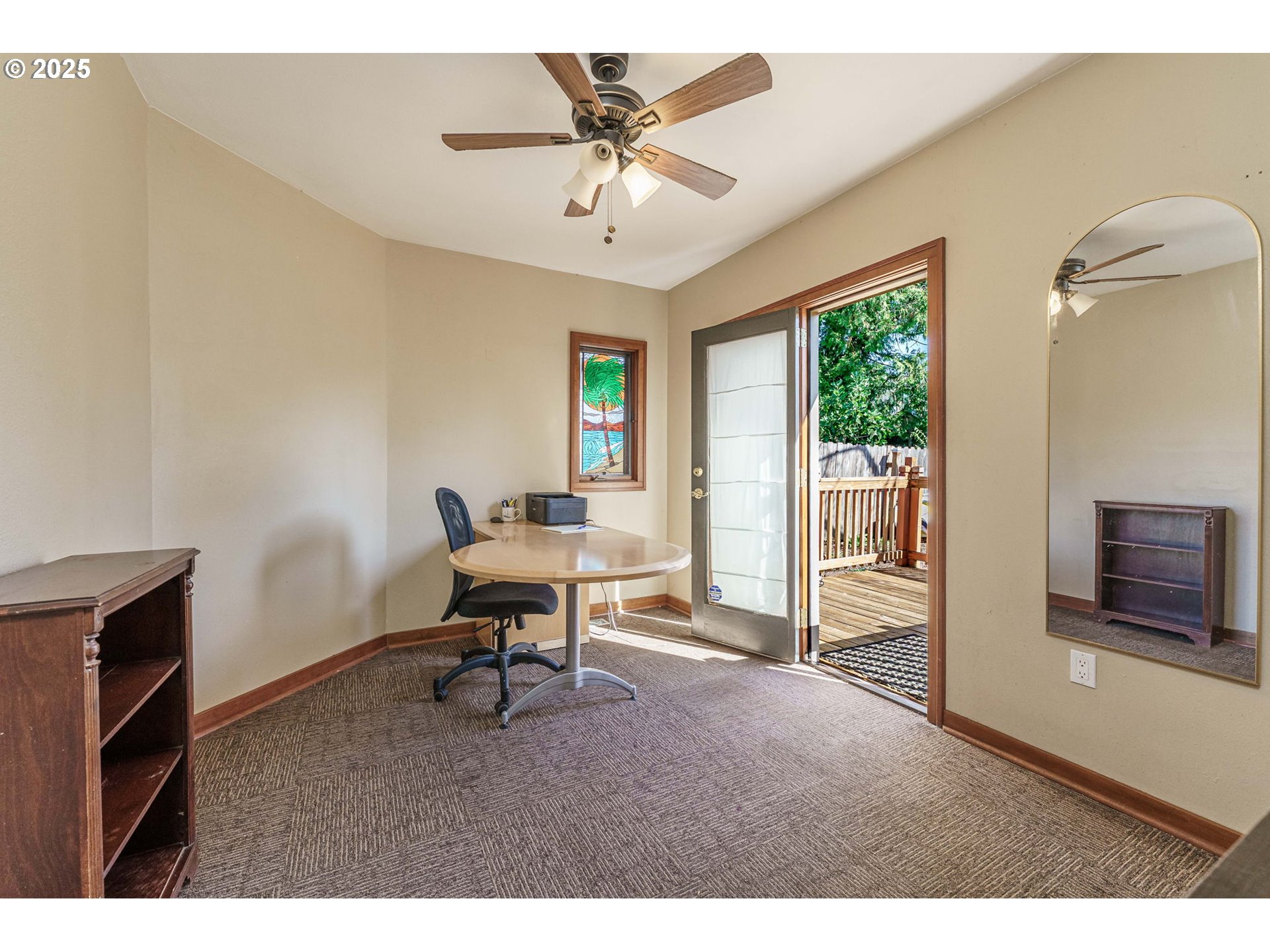 4216 Northeast 18th Avenue Portland, OR 97211 - Photo 21 of 46 a workspace with furniture and a window