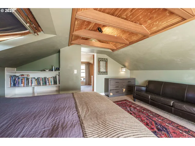 a view of a balcony with wooden floor