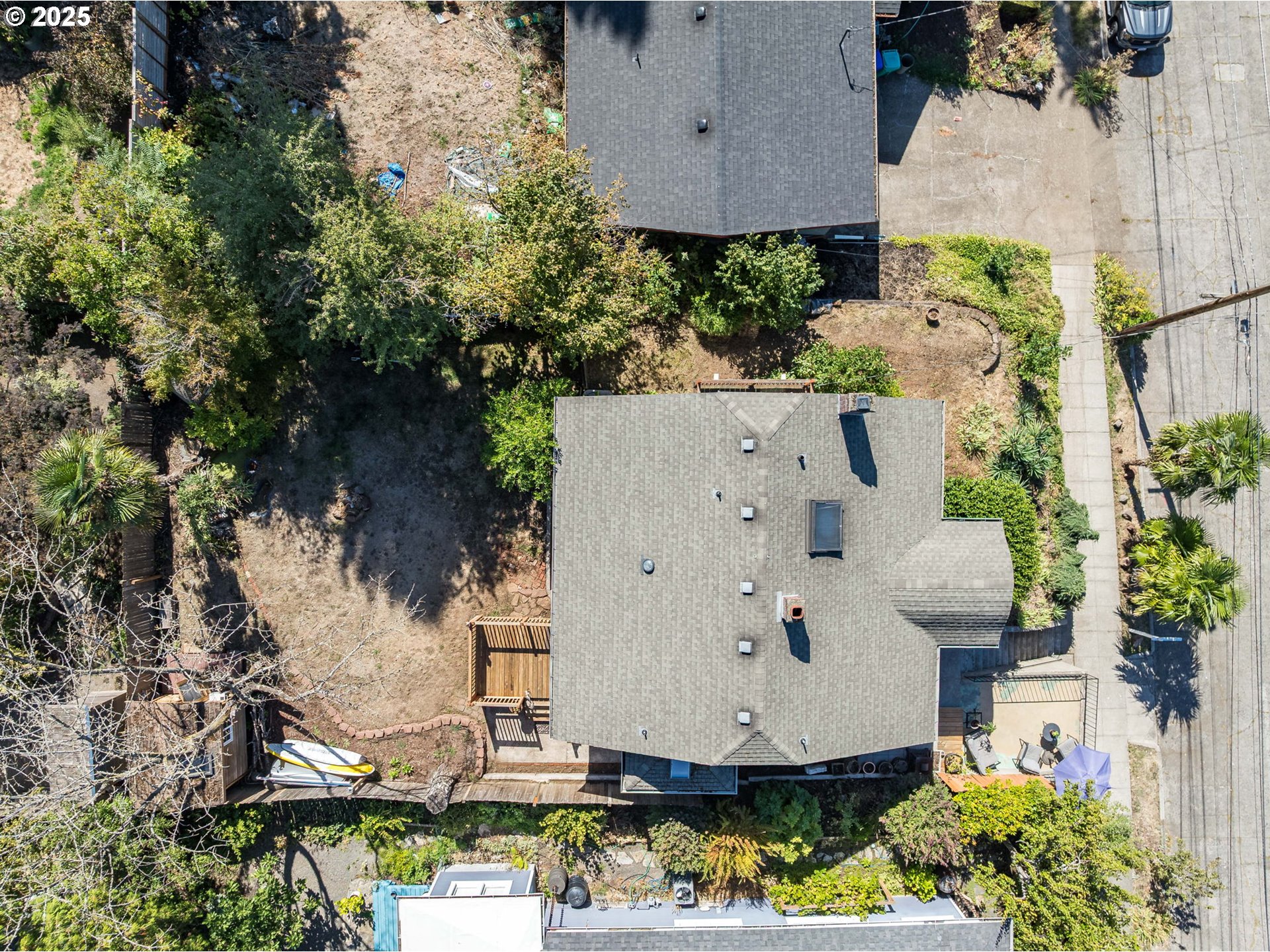 4216 Northeast 18th Avenue Portland, OR 97211 - Photo 41 of 46 an aerial view of a house with a yard and garden