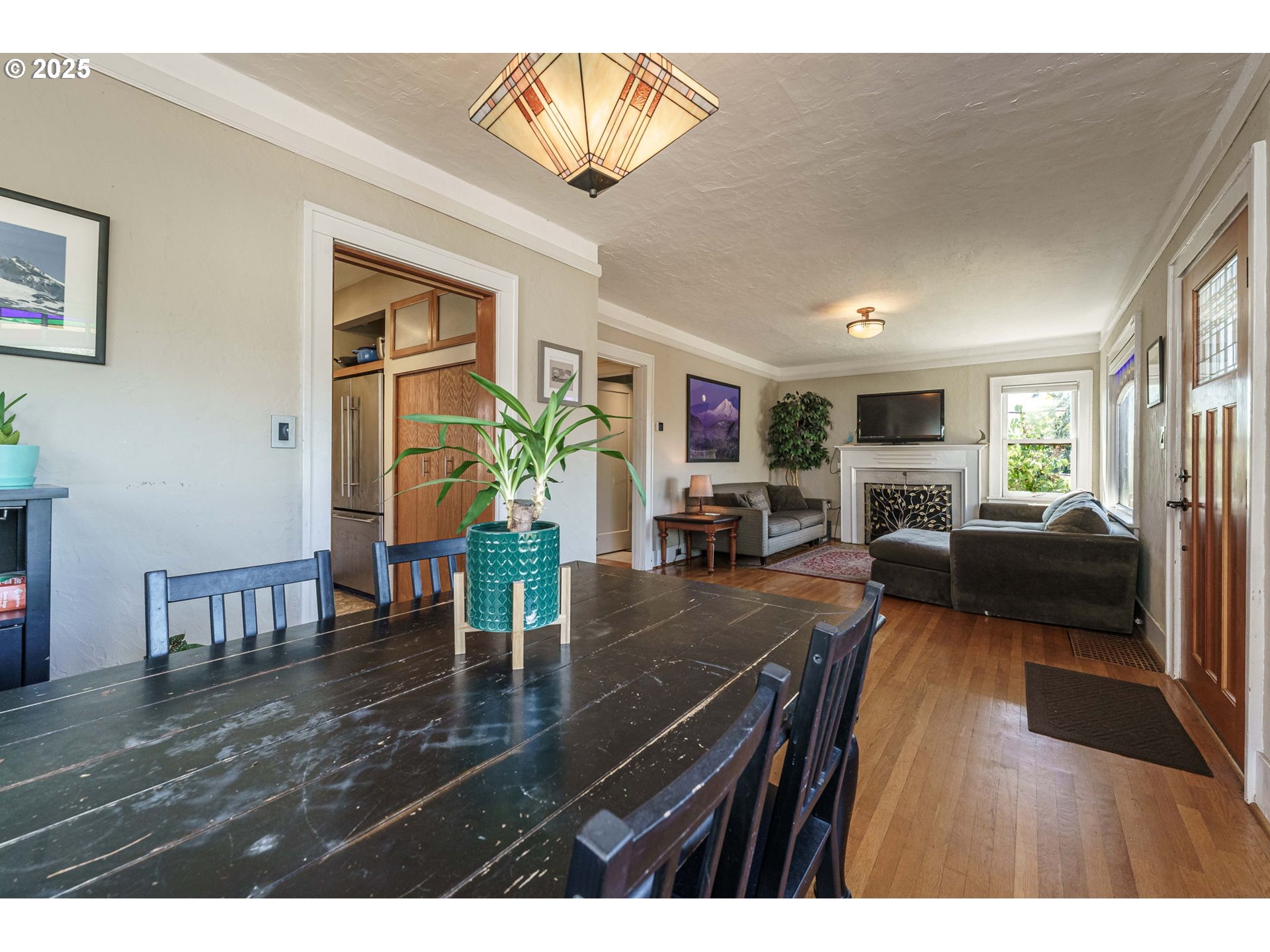 4216 Northeast 18th Avenue Portland, OR 97211 - Photo 10 of 46 a living room with furniture and a wooden floor