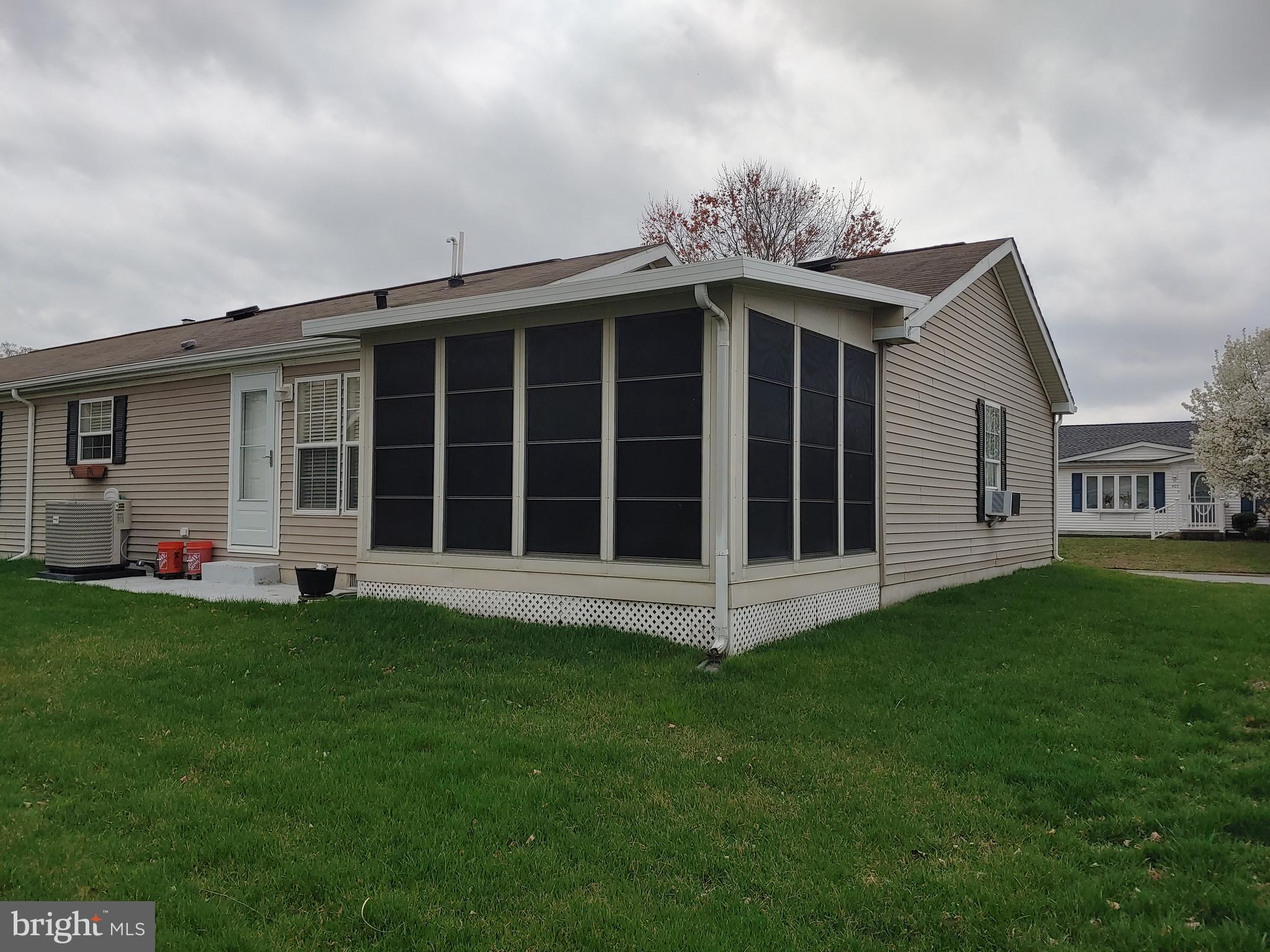 408 Moore Place, Unit 408 Dover, DE 19901 - Photo 3 of 34 Three Season Room