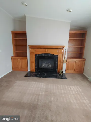 a living room with a fireplace