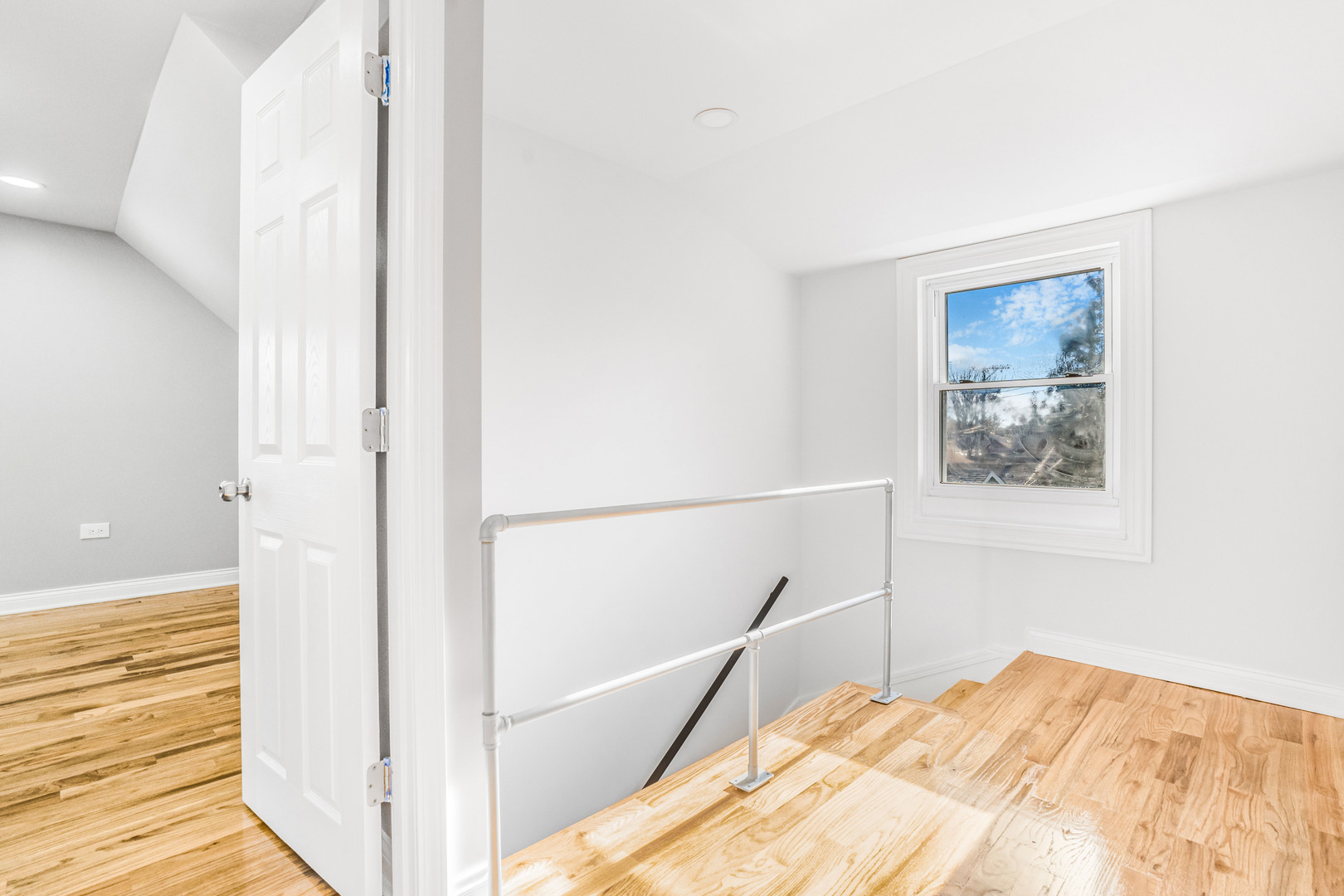 3519 West 80th Street Chicago, IL 60652 - Photo 13 of 22 a view of a bedroom with wooden floor and bathroom