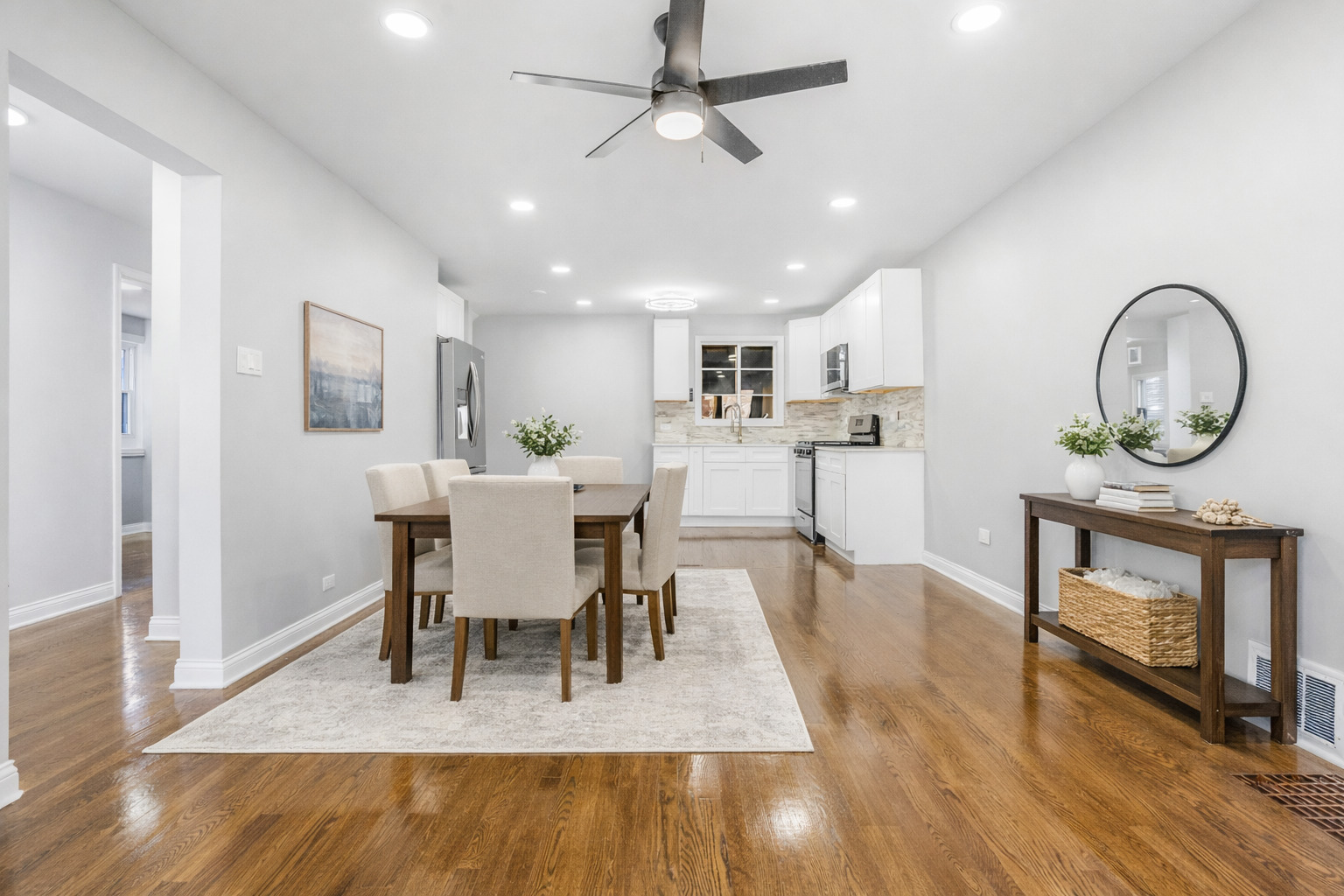 3519 West 80th Street Chicago, IL 60652 - Photo 3 of 22 a view of a dining room with furniture and wooden floor