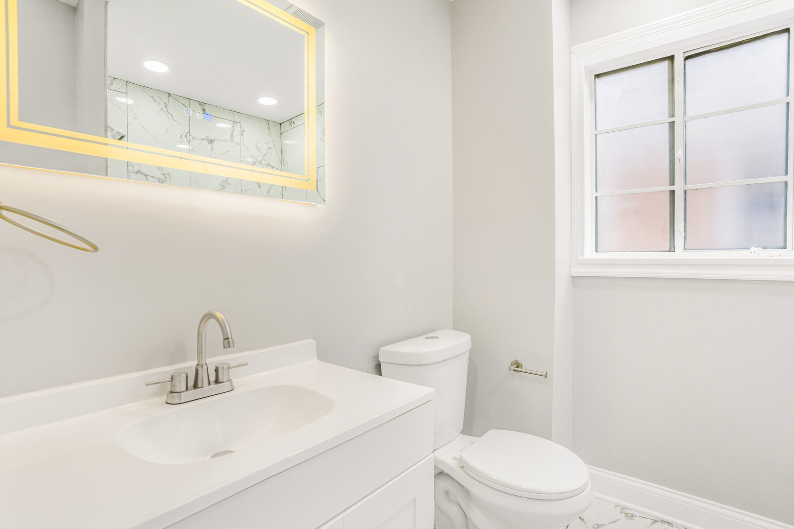 3519 West 80th Street Chicago, IL 60652 - Photo 10 of 22 a bathroom with a sink a toilet and a mirror