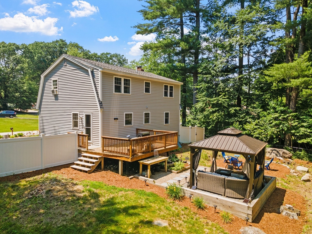 54 Alpine Street Milford, NH 03055 - Photo 2 of 33 a view of a house with pool and chairs
