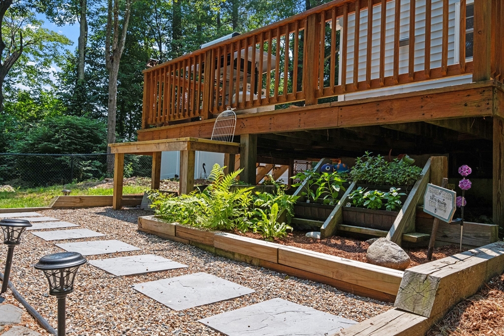 54 Alpine Street Milford, NH 03055 - Photo 25 of 33 a house view with a garden space
