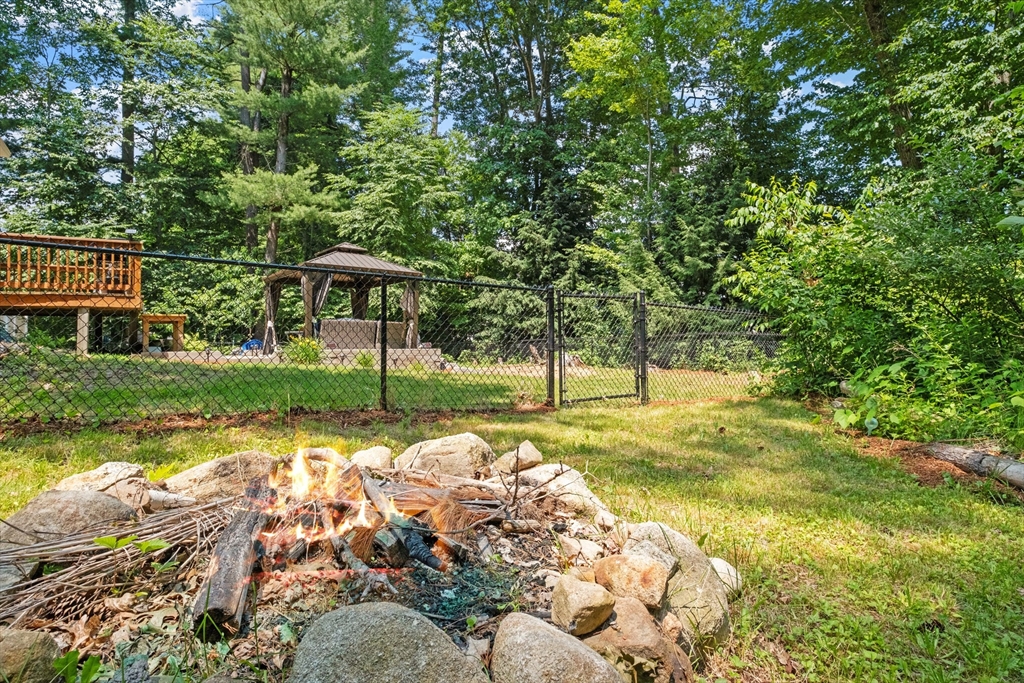 54 Alpine Street Milford, NH 03055 - Photo 29 of 33 a view of a house with backyard