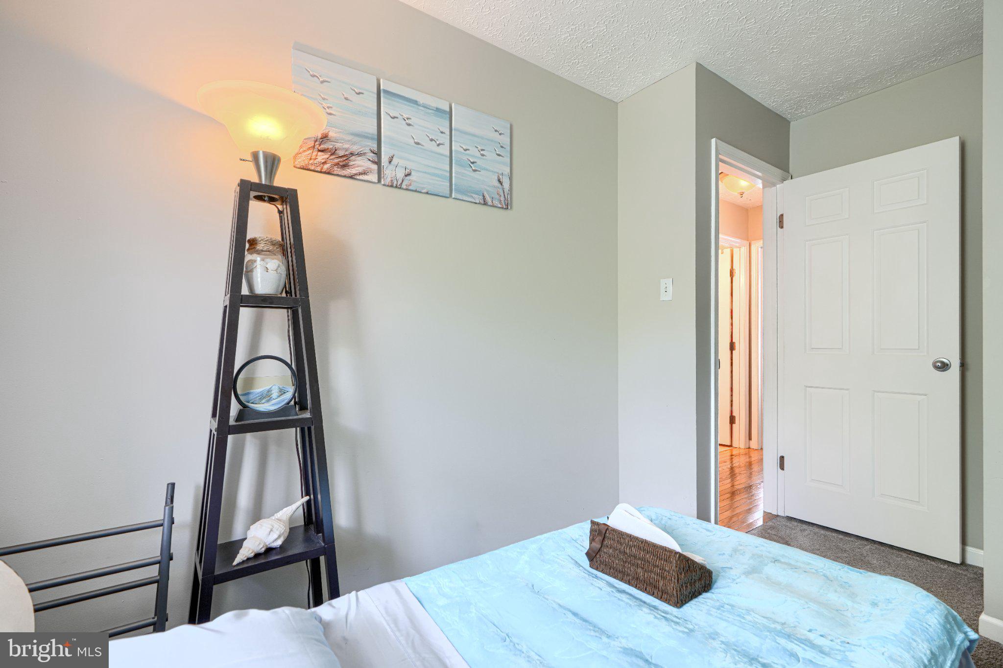 4067 Rustico Road Baltimore, MD 21220 - Photo 19 of 31 Serene bedroom with calming decor.