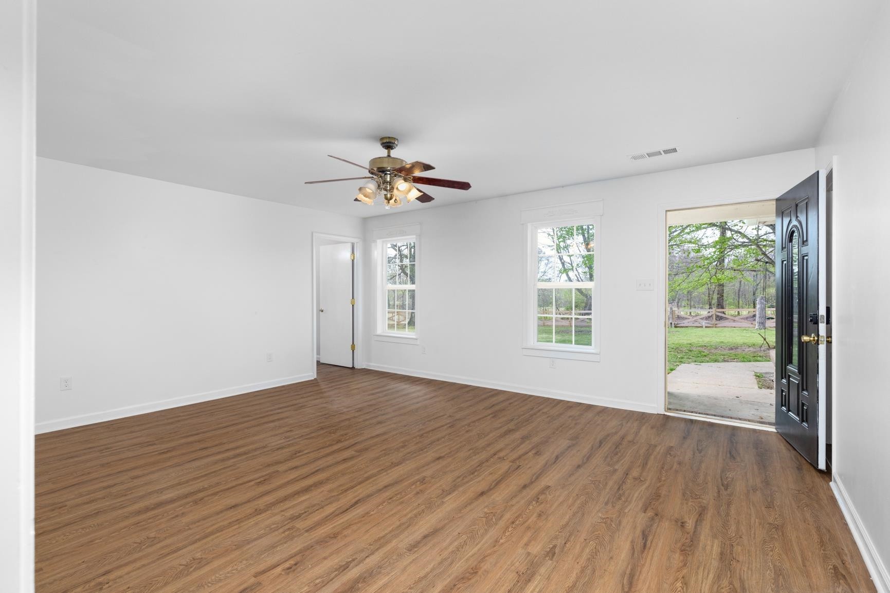 1388 Double Bridges Road Munford, TN 38058 - Photo 3 of 31 a view of an empty room with glass door