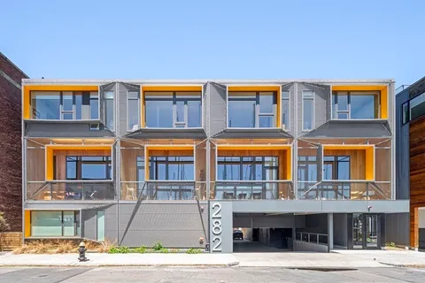 a front view of a multi story building