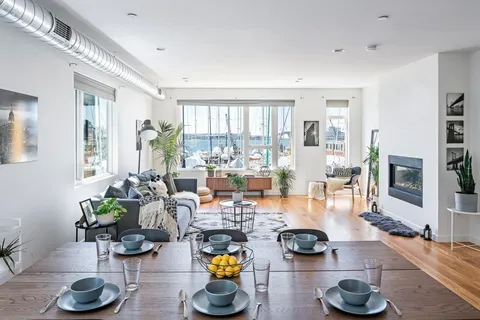a room with furniture and a wooden floor