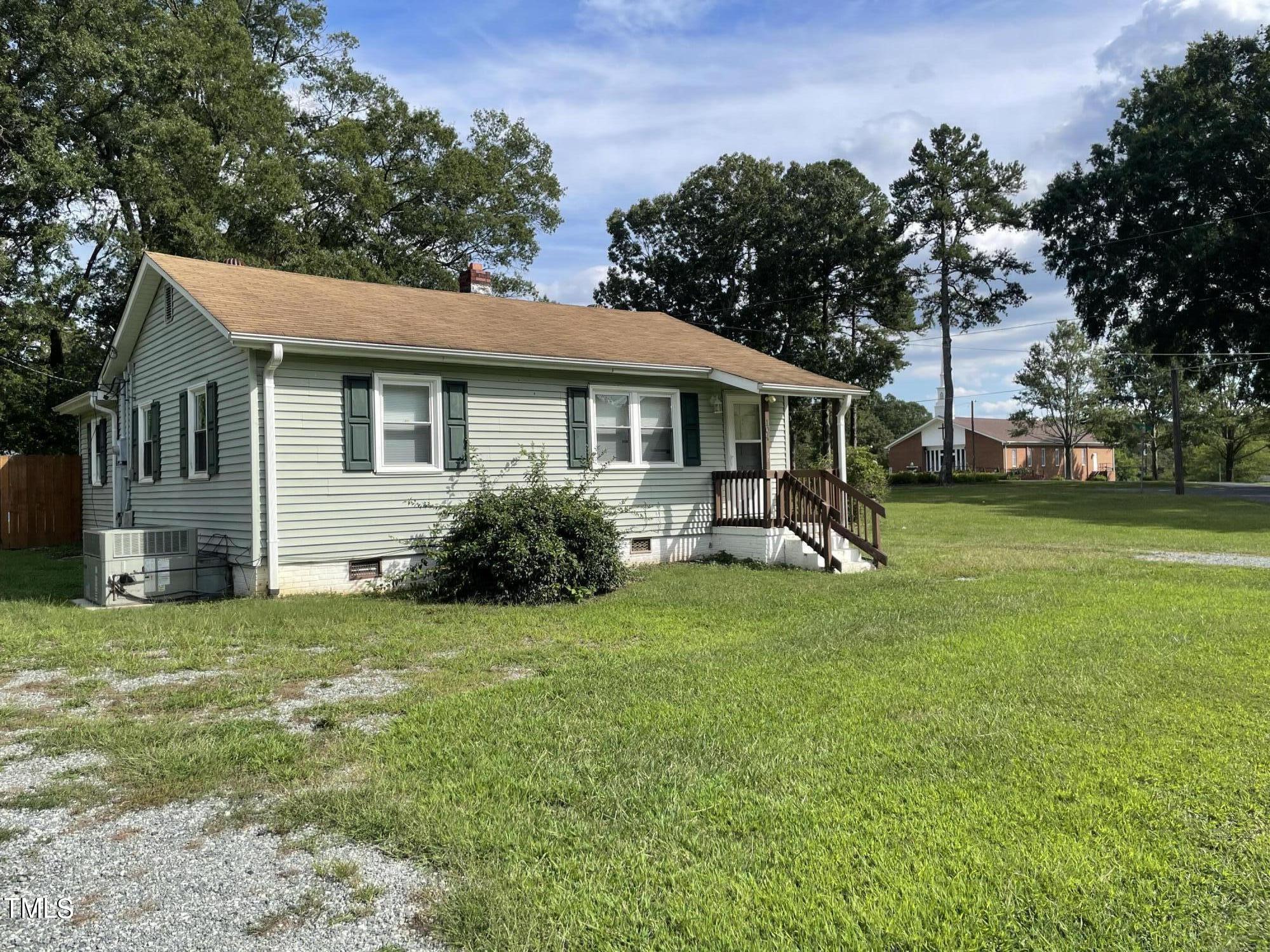 104 Summers Drive Elon, NC 27244 - Photo 2 of 11 a view of a house with a yard