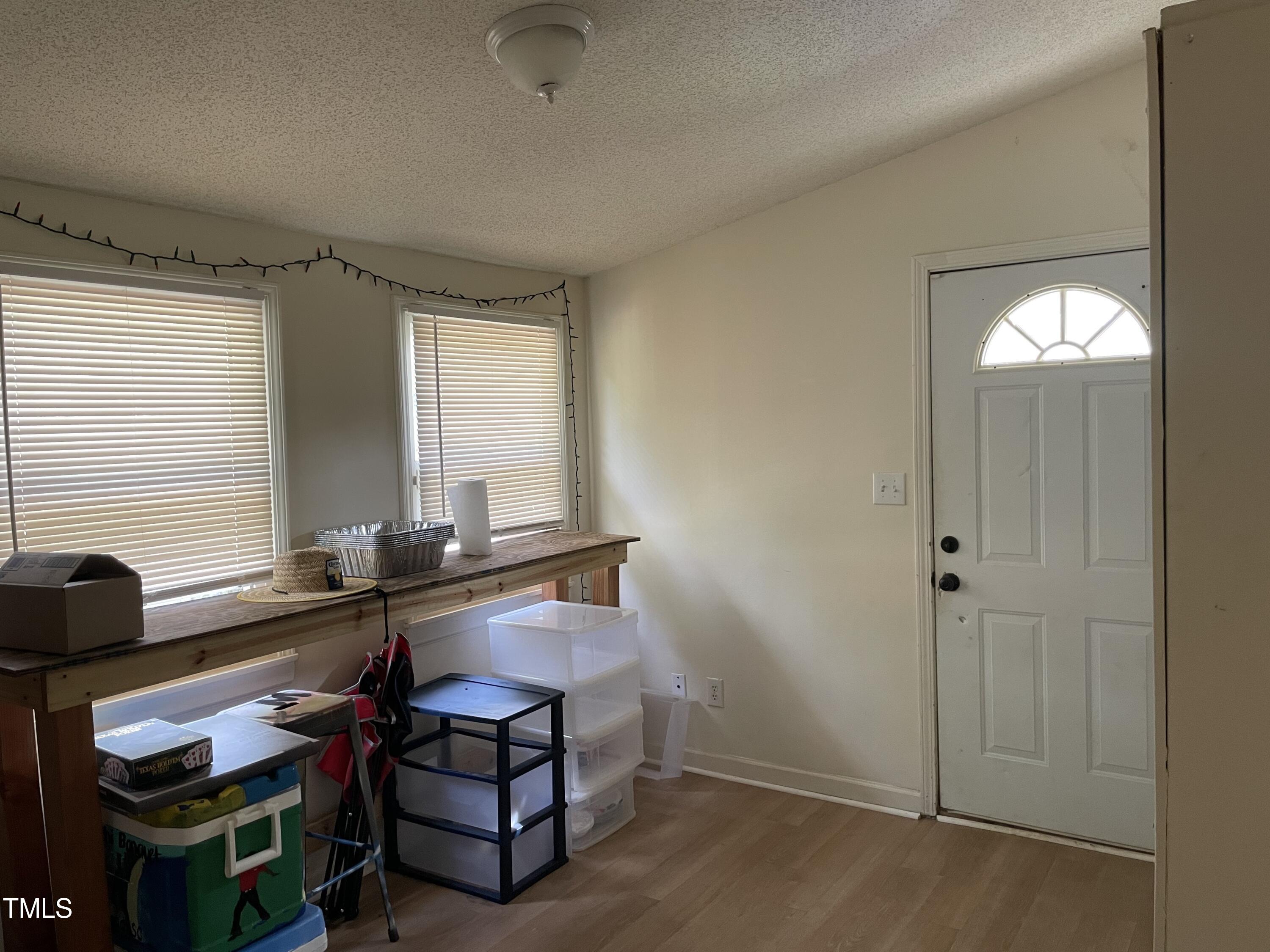 104 Summers Drive Elon, NC 27244 - Photo 3 of 11 a room with furniture and window