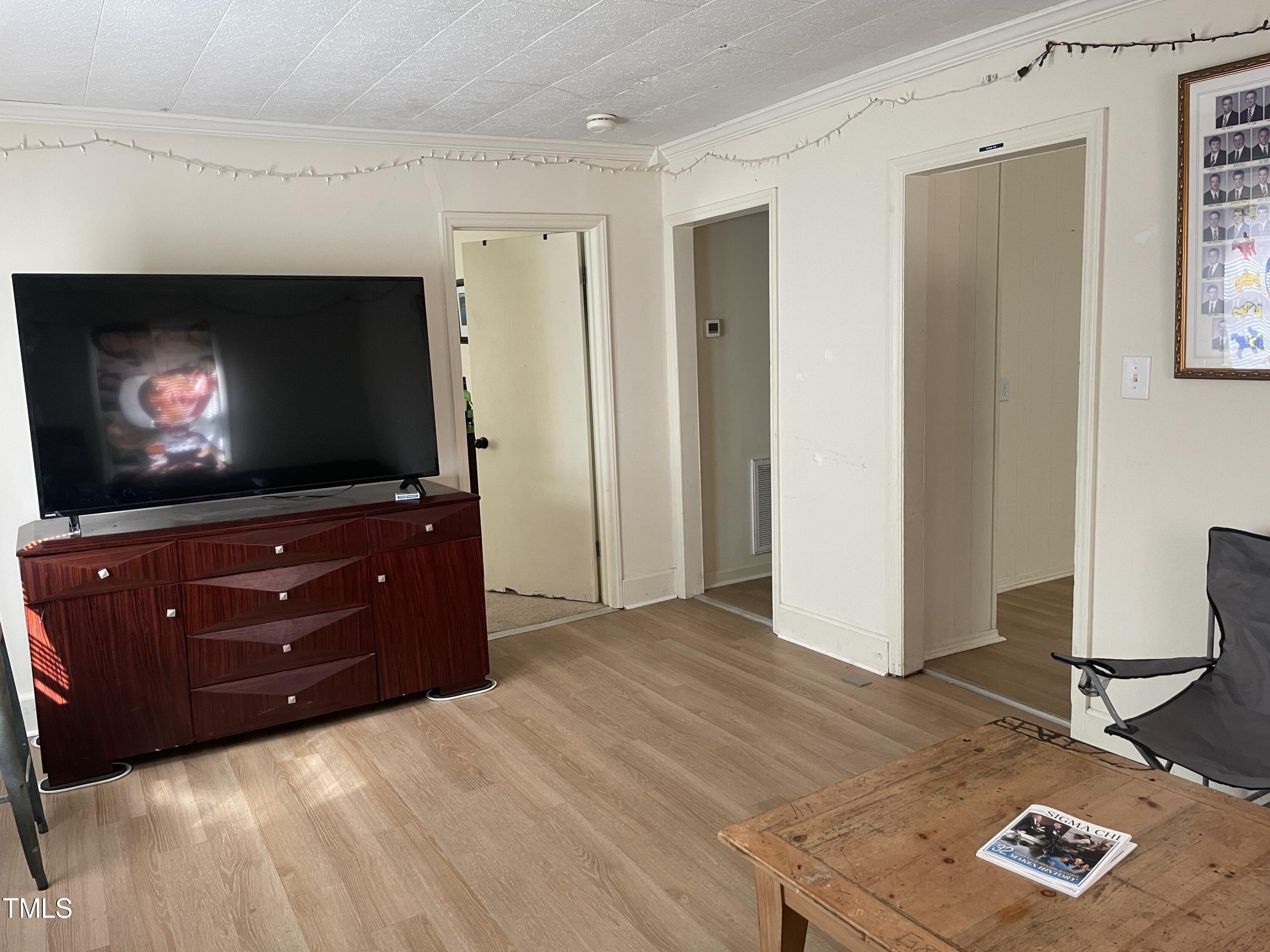 104 Summers Drive Elon, NC 27244 - Photo 4 of 11 a room with a bed and a television