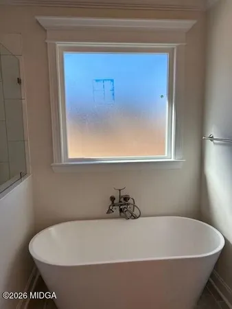 a bathroom with a bathtub