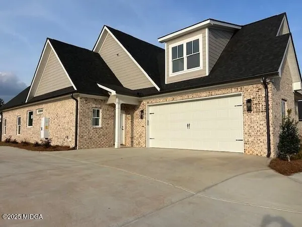 a view of a house with a garage