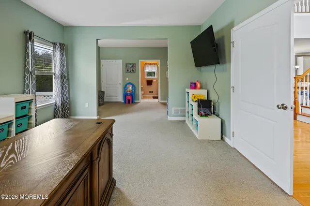 a large kitchen with granite countertop a sink and counter space