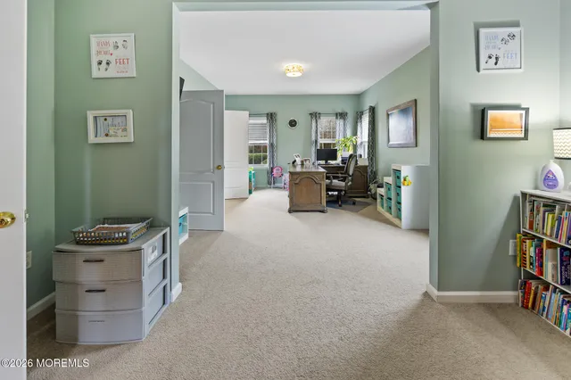 a bed room with furniture and a window