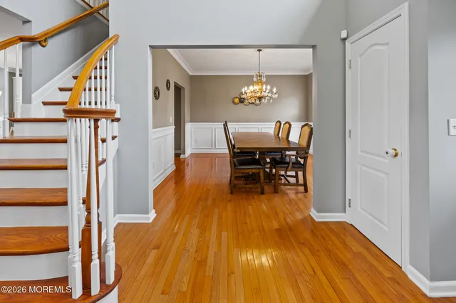 a spacious bathroom with a double vanity sink and a bathtub