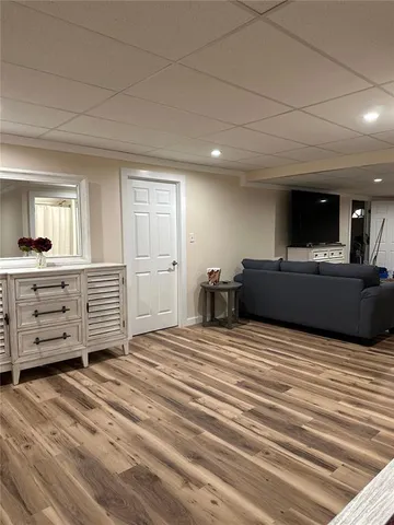 a room with a bed and furniture