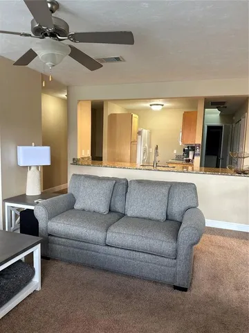 a view of a bedroom from a hallway