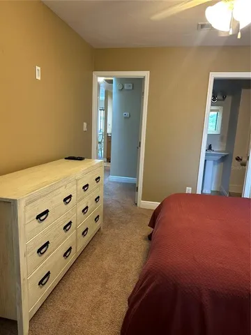 a view of a living room and wooden floor