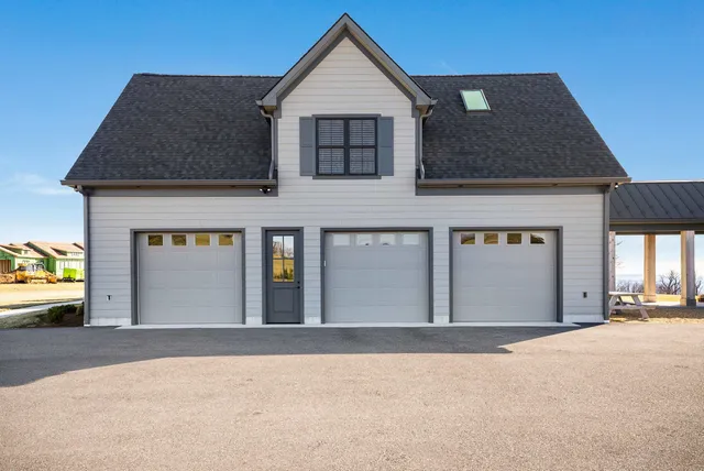 a view of a house with a big yard