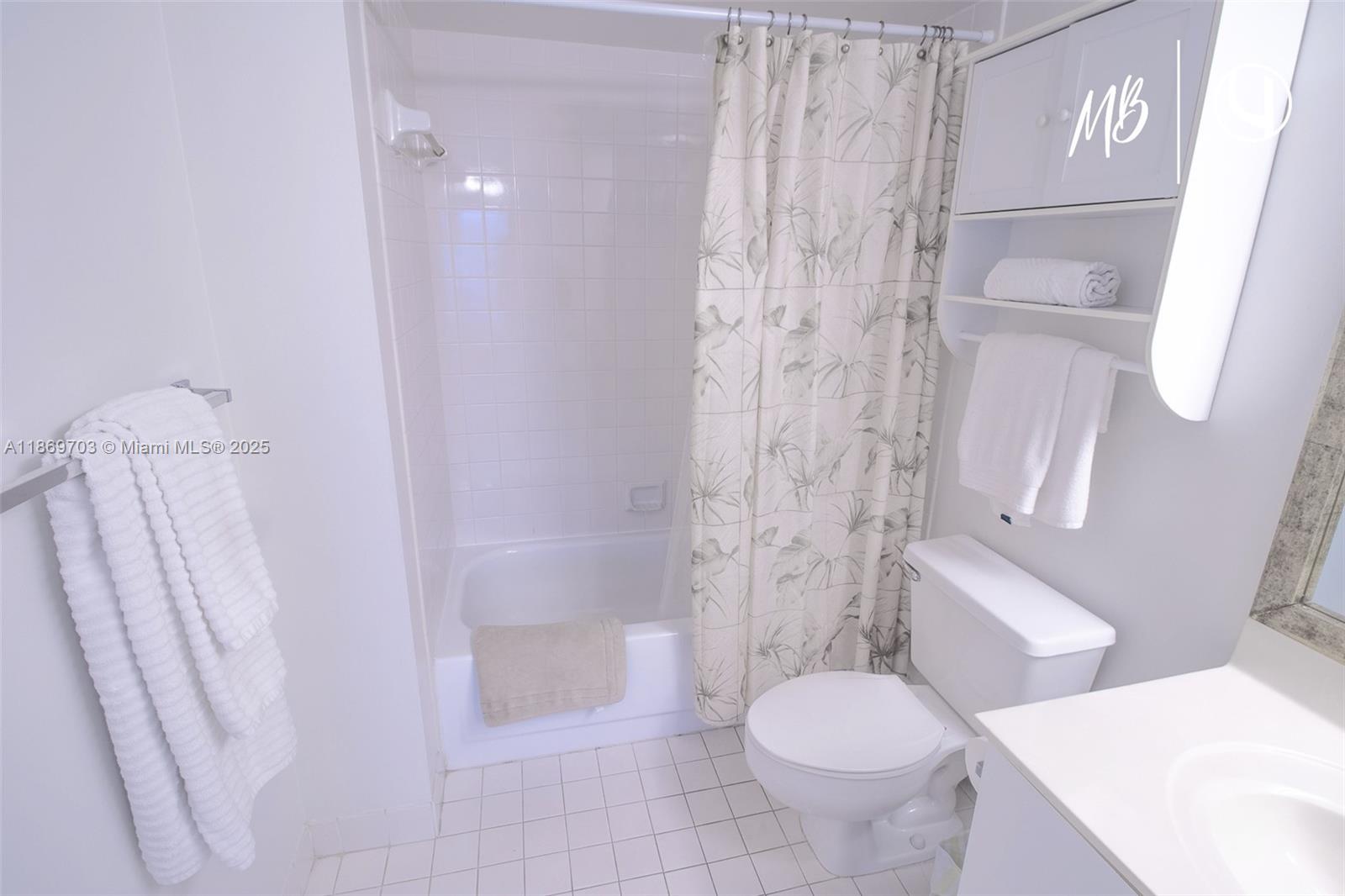 17801 North Bay Road, Unit 410 Sunny Isles Beach, FL 33160 - Photo 3 of 24 a bathroom with a toilet and a shower