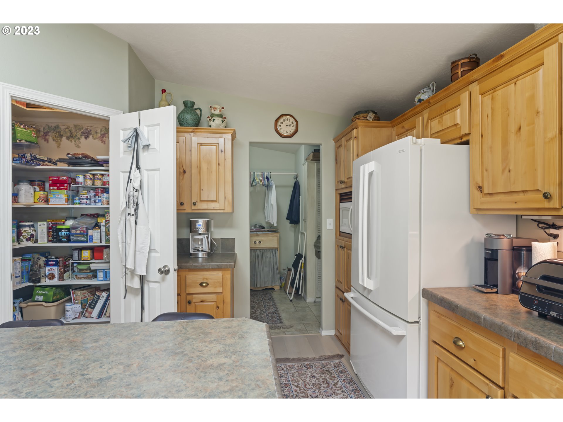 175 Florentine Avenue Florence, OR 97439 - Photo 12 of 27 a kitchen with stainless steel appliances granite countertop a refrigerator and a stove
