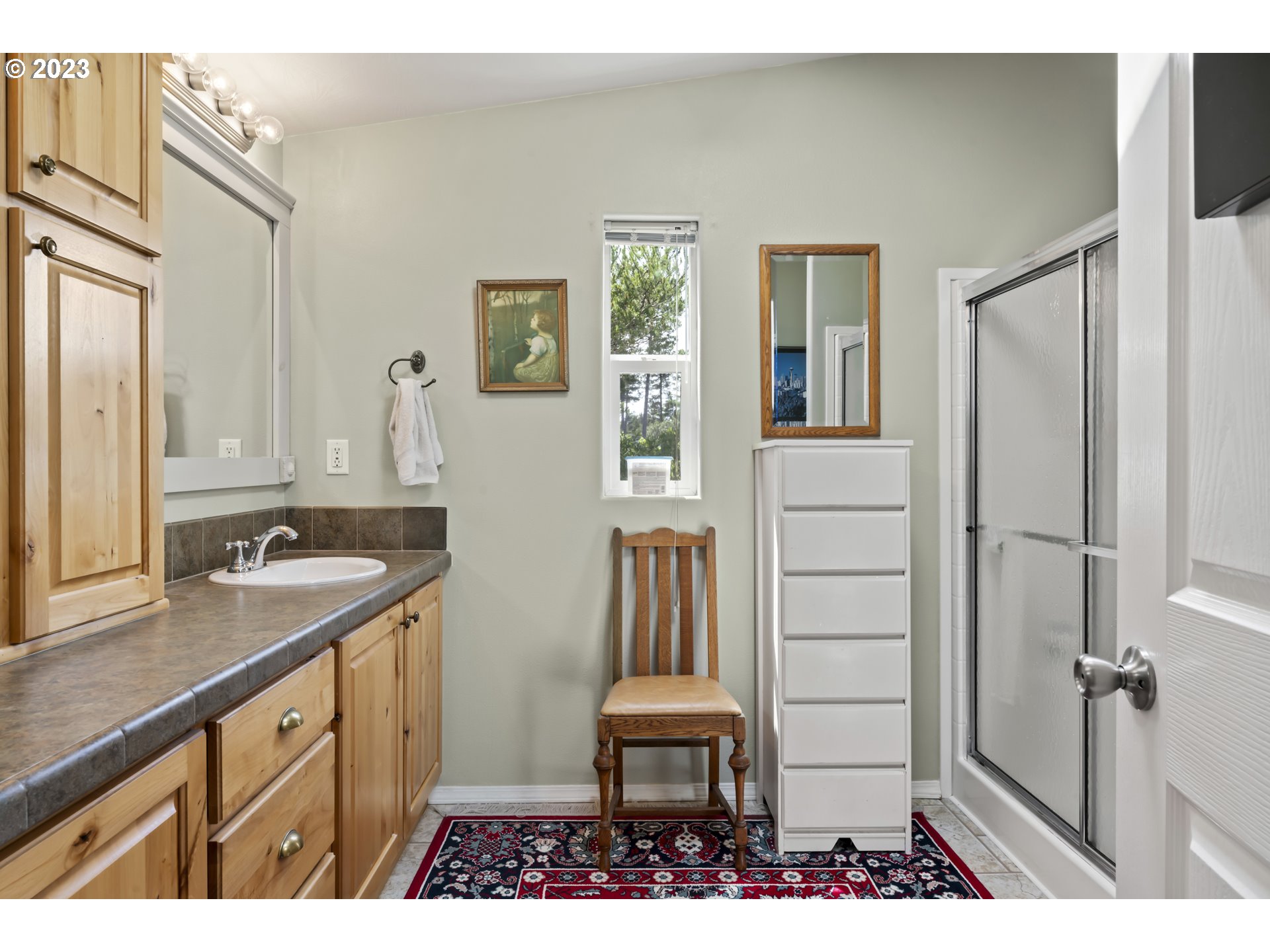 175 Florentine Avenue Florence, OR 97439 - Photo 17 of 27 a bathroom with a sink and a mirror