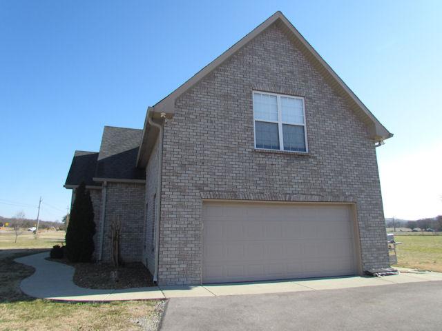 3676 Big Springs Road Lebanon, TN 37090 - Photo 13 of 20 There is a 2 car garage on the side of the home and has an exterior door leading to the back yard.