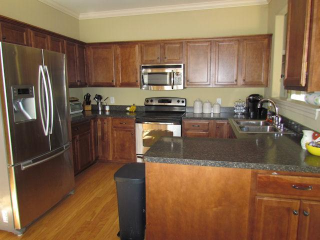 3676 Big Springs Road Lebanon, TN 37090 - Photo 4 of 20 In the kitchen there is a stove with a single oven, built in microwave and dishwasher.