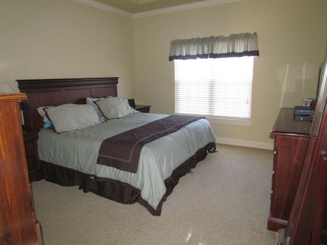 3676 Big Springs Road Lebanon, TN 37090 - Photo 6 of 20 The master bedroom has carpet, a ceiling fan, a tray ceiling and fabulous walk in closet.