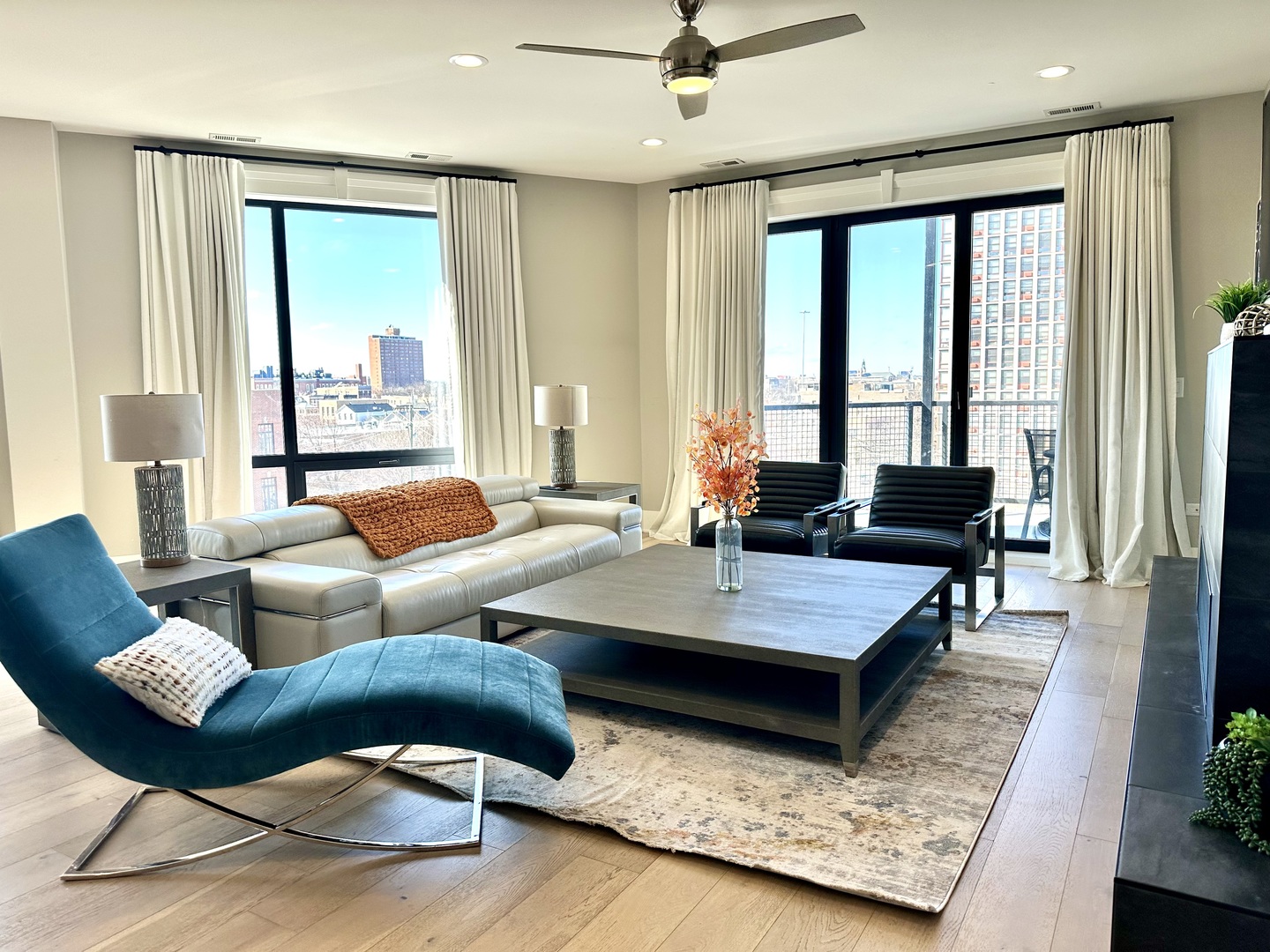 1157 West Erie Street, Unit 5W Chicago, IL 60642 - Photo 12 of 30 a living room with furniture and a large window