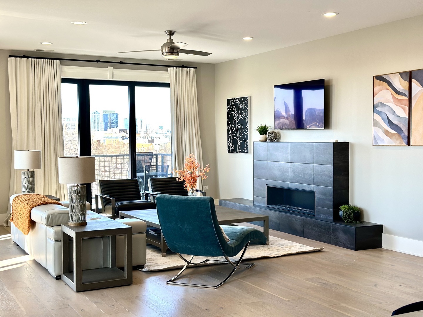 1157 West Erie Street, Unit 5W Chicago, IL 60642 - Photo 13 of 30 a living room with furniture and a fireplace