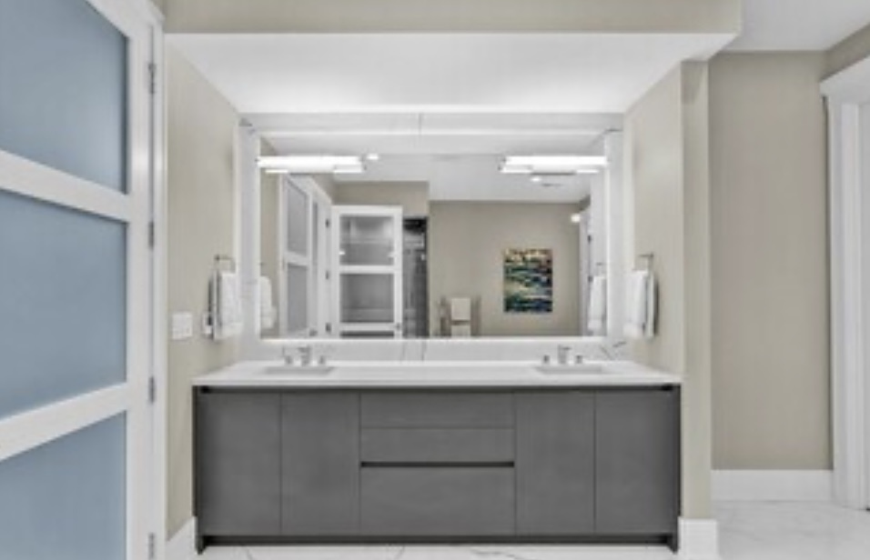 1157 West Erie Street, Unit 5W Chicago, IL 60642 - Photo 22 of 30 a bathroom with a sink vanity and mirror
