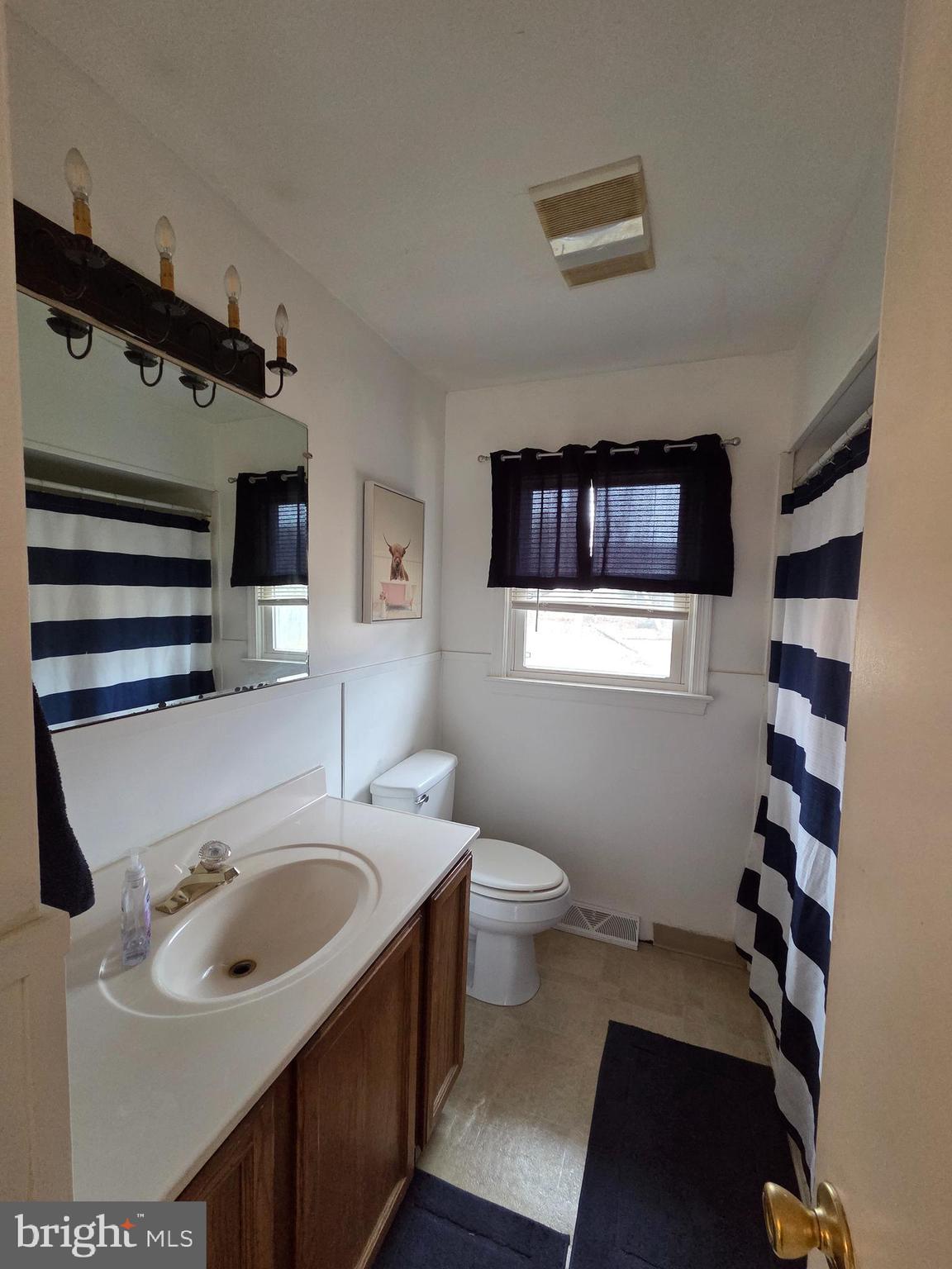 64 Rosedale Drive Bridgeton, NJ 08302 - Photo 9 of 16 a bathroom with a sink toilet and shower