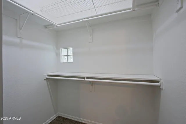 an empty room with closet