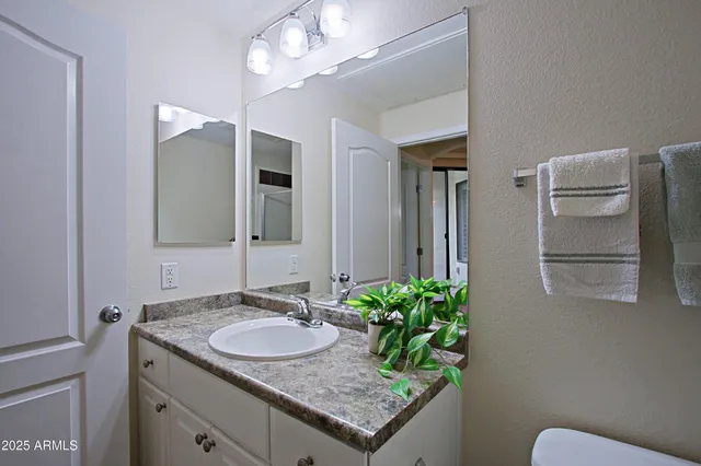 a view of a dining room with furniture window and outdoor view