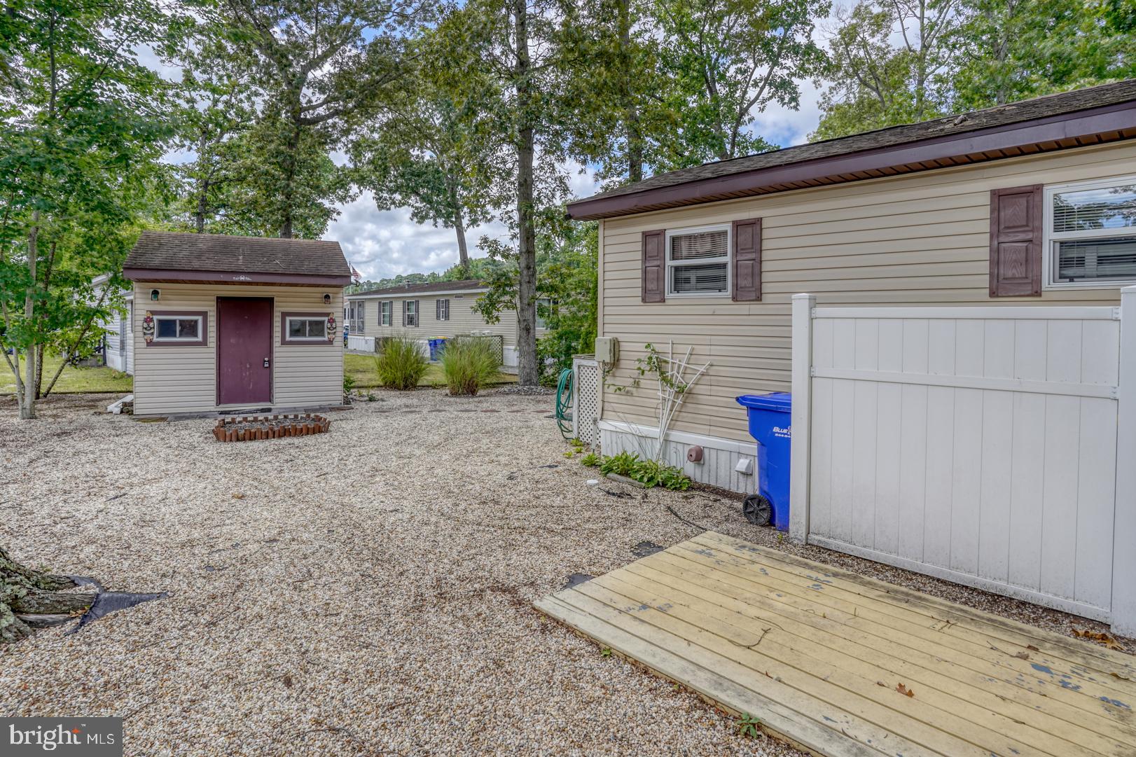 25780 Blue Ridge Street, Unit 4198 Millsboro, DE 19966 - Photo 11 of 36 a view of a house with a backyard