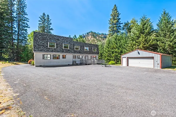 a view of balcony with wooden floor
