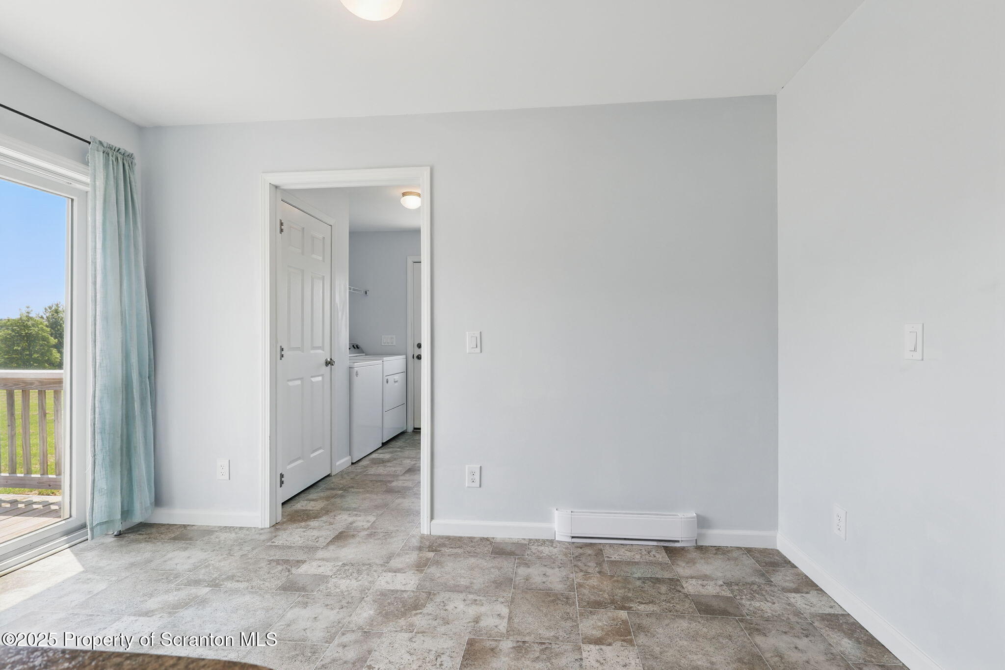 960 Lott Road Meshoppen, PA 18630 - Photo 14 of 40 an empty room with a bathroom and a window
